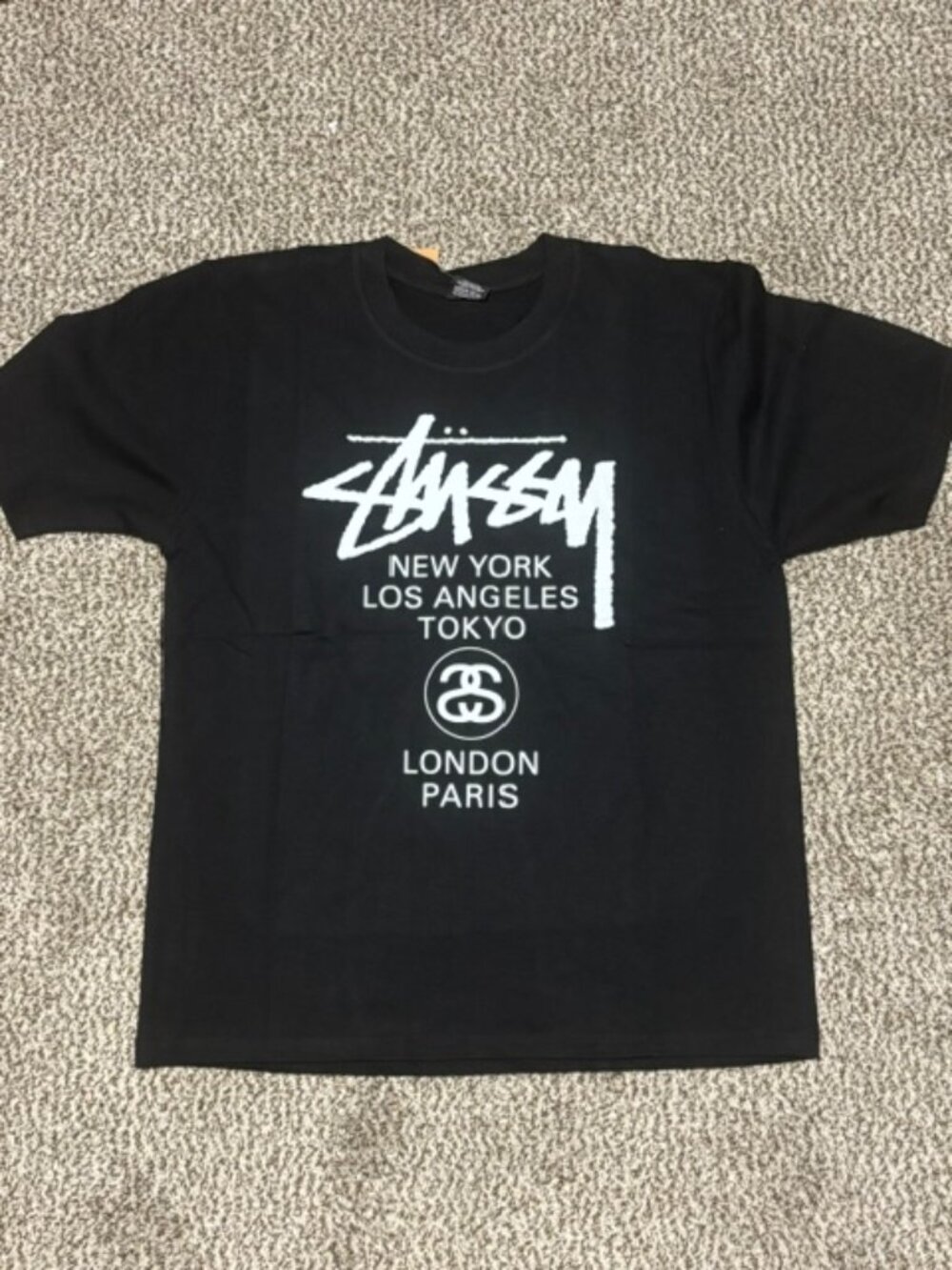 Stüssy World Tour Black Graphic T-Shirt Front Back Logo